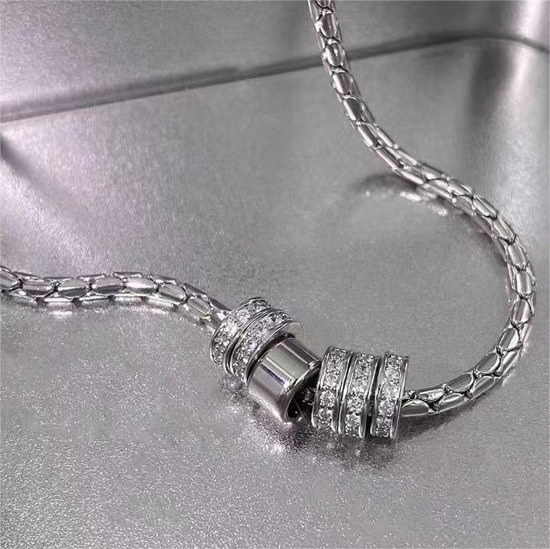 minimalist and cool-toned titanium steel diamond-accented hoop pendant necklace