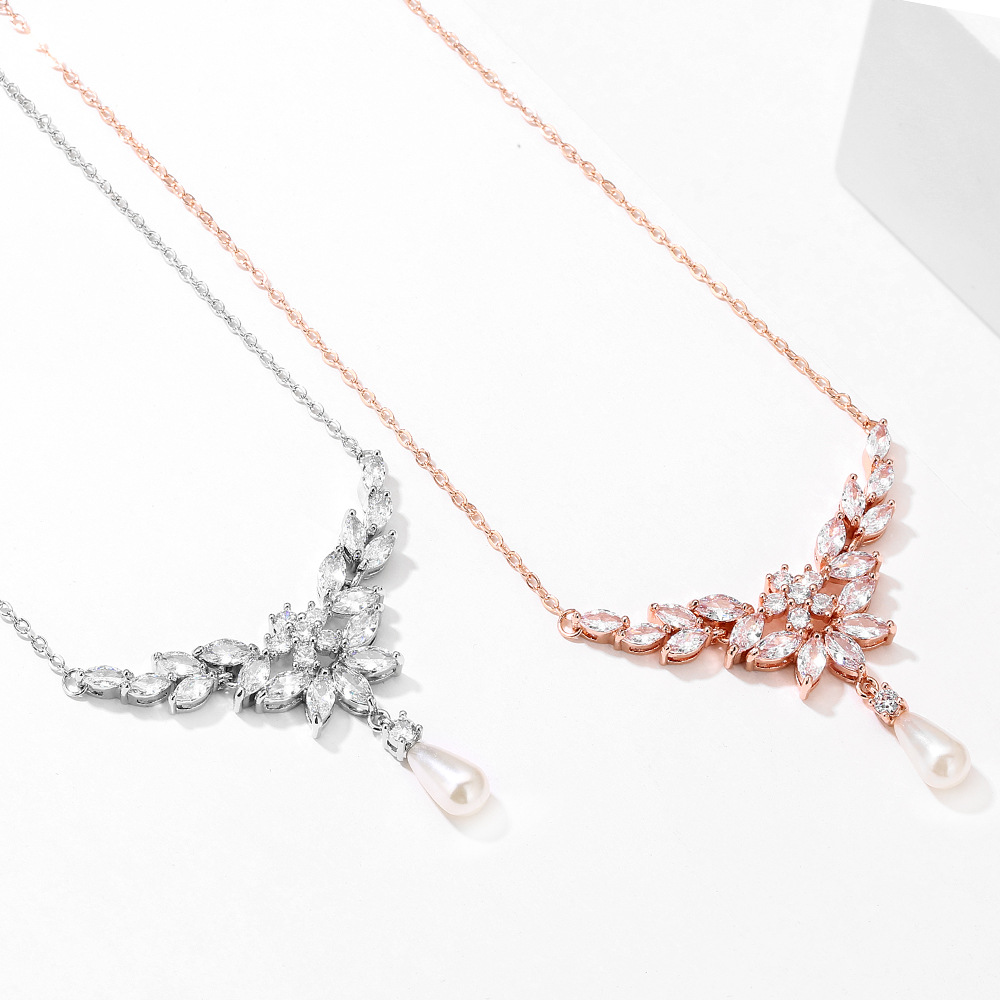 Elegant Pearl Pendant Necklace with Vintage Leaf and Zircon Design